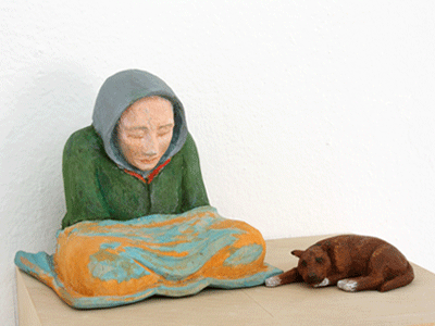 A beggar with a dog