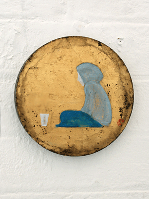 A beggar painting on brass